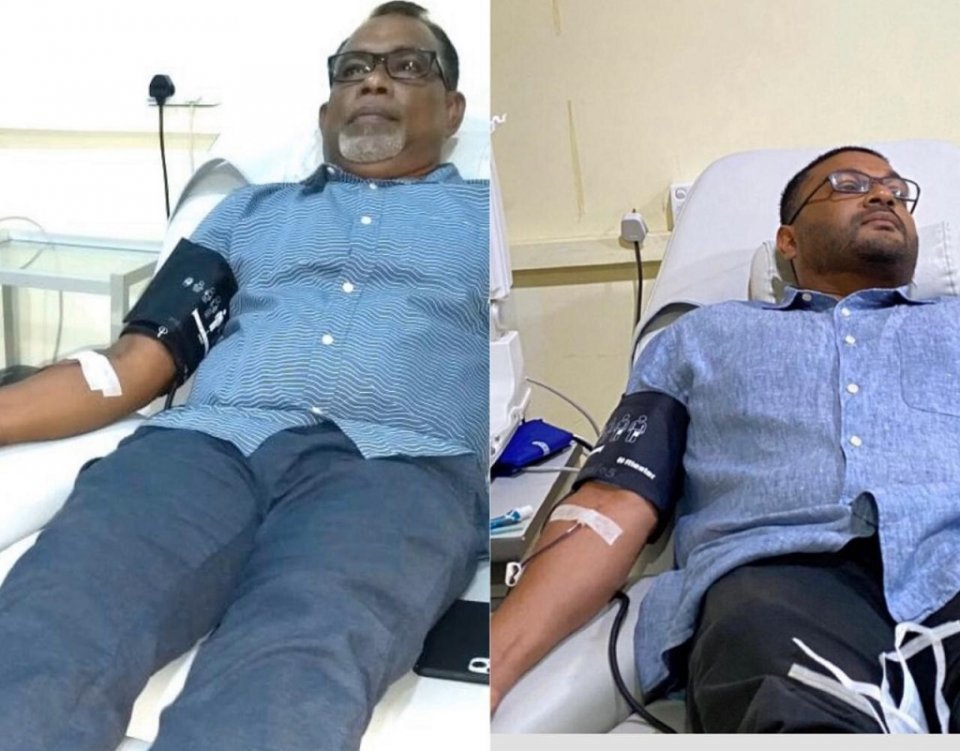 Members of opposition coalition donate blood