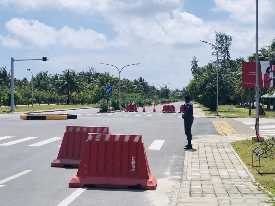 Police supervise traffic on Gan Link Road as island under monitoring