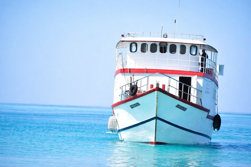 Missing man from capsized boat found clinging onto a wooden board