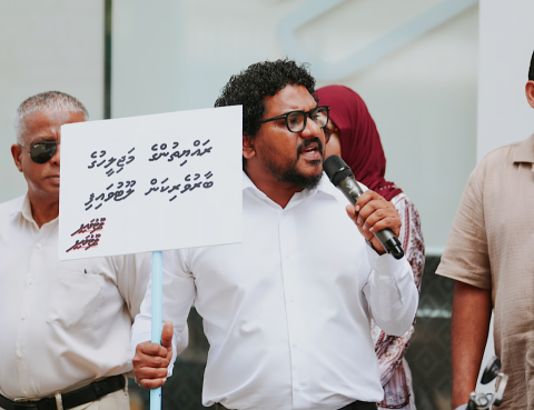 MDP MPs protest stage a protest outside the Finance Ministry