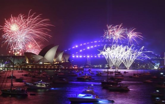 World ushers in 2020 amid protests and wildfires