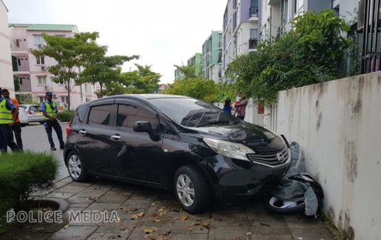 Out of control car crashes on motorbikes