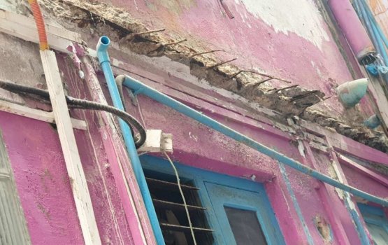 Falling balcony debris leaves two injured