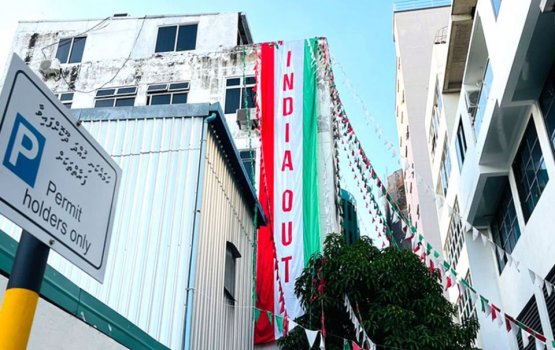 MP issues warning to policemen removing 'IndiaOut' banners