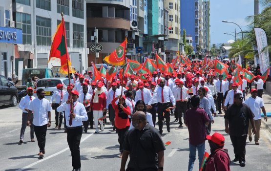 Throng of supporters accompany Gasim as he files candidacy