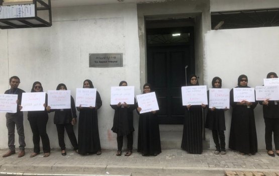 Tax appeal tribunal employees protest for a pay rise