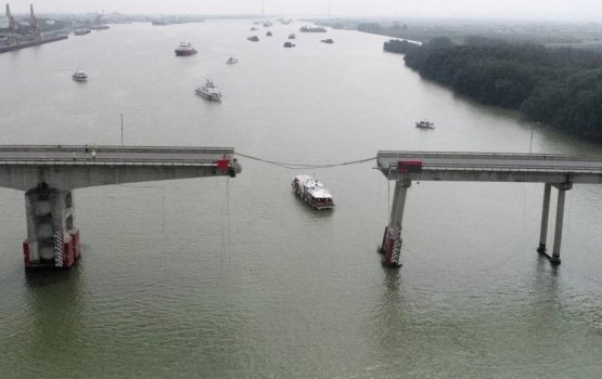 Two dead after chip collides with China bridge