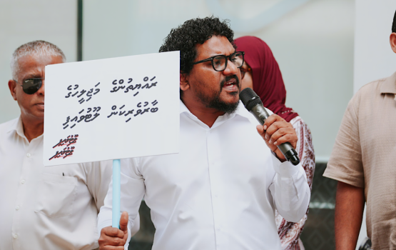 MDP MPs protest stage a protest outside the Finance Ministry