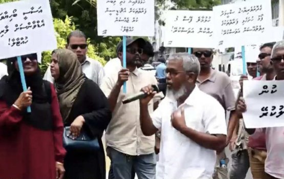 MDP supporters stage a protest near the Housing Ministry