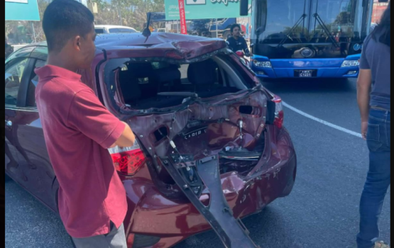 2 injured in a collision between a car and a motorcycle